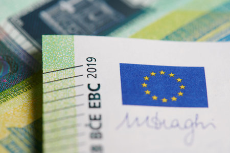 Euro flag on 100 banknote macro close up viewの写真素材