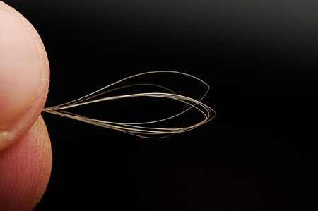 White human hair close up view in finger