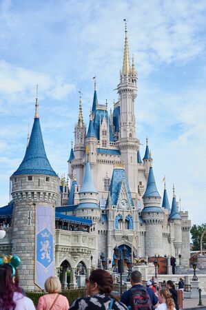 Orlando, USA - january 19, 2020: People walk at disney magic kingdom castle at day timeのeditorial素材
