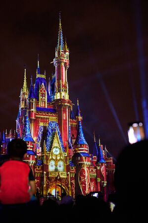 Orlando, USA - january 19, 2020: People enjoy party at disney park on castle backgroundのeditorial素材