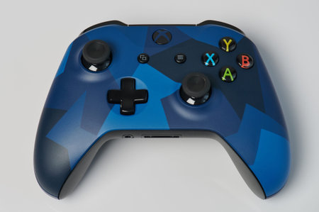 New-York , USA - February  11, 2020: Blue xbox game pad controller isolated on white background