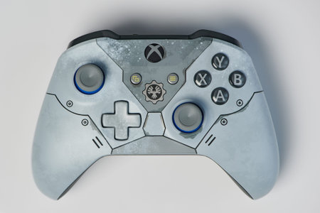 New-York , USA - February  11, 2020: Grey gaming xbox controller isolated on white background