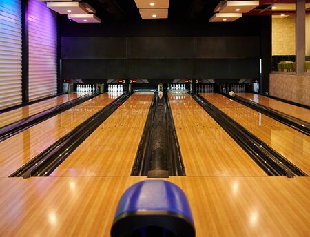 Bowling lanes in club. Empty bowling alley front viewの写真素材