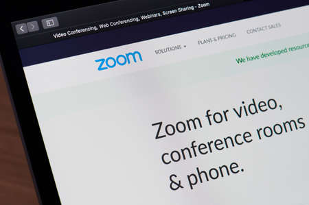 New-York , USA - April 1, 2020: Zoom official web page on laptop screen close up viewのeditorial素材