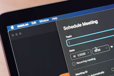 New-York , USA - April 1, 2020: Schedule meeting in zoom app on laptop screen close up viewのeditorial素材