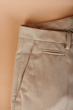 Empty pocket of man beige color pants macro viewの写真素材