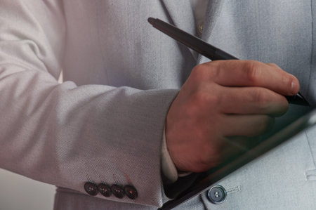 Business man work with tablet on digital document close up view