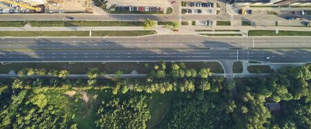 Long empty highway road above top drone viewの写真素材