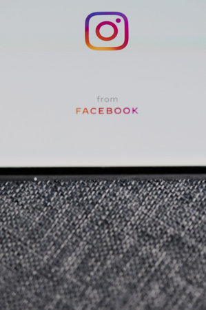 New-York , USA - June 18 , 2020: Start Instagram app on smartphone screen close up view in gray backgroundのeditorial素材