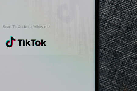New-York , USA - June 18 , 2020: Tik tok app menu on smartphone in gray background close up viewのeditorial素材
