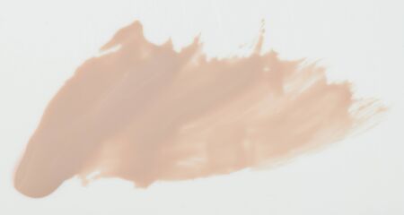 Brown paint stain isolated on white background close up viewの写真素材