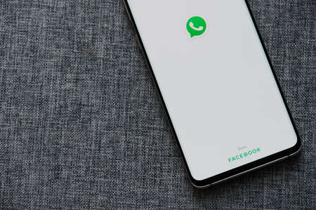 New-York , USA - June 18 , 2020: Whatsapp from Facebook smartphone  app screen macro view in gray backgroundのeditorial素材