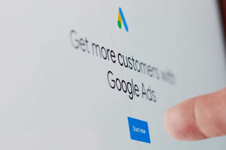 New york, USA - October 27, 2020: Start google ad with touch screen display close up viewのeditorial素材
