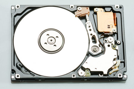 Laptop hard drive with cylinder  isolated on white studio background