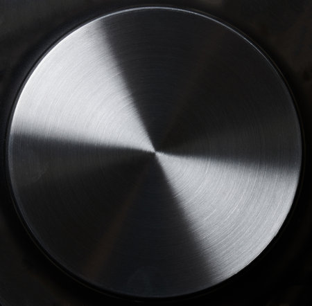 Round metal brushed surface from pan flat viewの写真素材