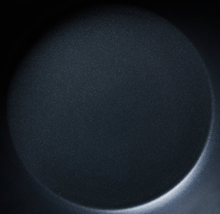 Round teflon cooking pan  surface macro close up viewの写真素材
