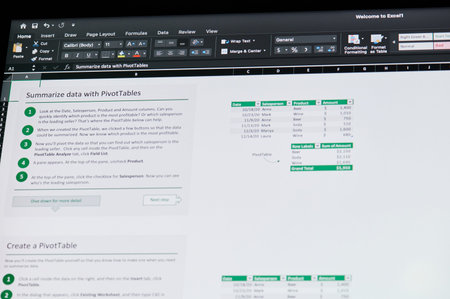 New york, USA - December 14, 2020: Editing excel xls spreadsheet  on laptop screen macro close up...