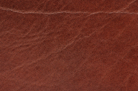 Wrinkled brown leather surface macro close up viewの写真素材