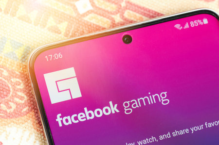 New york, USA - January 26, 2021: Facebook gaming service on smartphone screen close up view. Play...