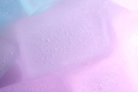 Pink ice with bubbles surface macro close up viewの写真素材
