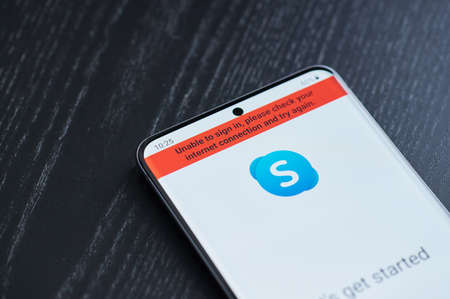 New york, USA - March 22, 2021: Blocked or lost connection skype app on smartphone screen laying on tableのeditorial素材