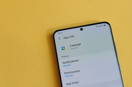 New york, USA - April 12, 2021: Changing privacy setting in google calendar app on smartphone screen...