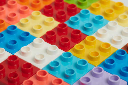 Set of colorful plastic bricks background close up viewの写真素材