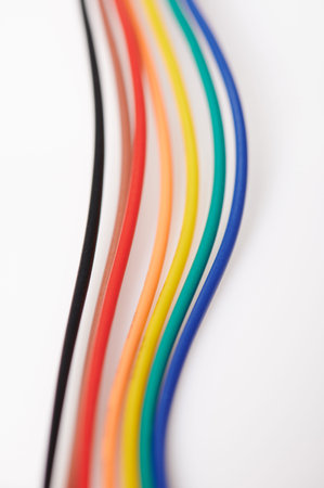 Colorful cables lines isolated on white studio background