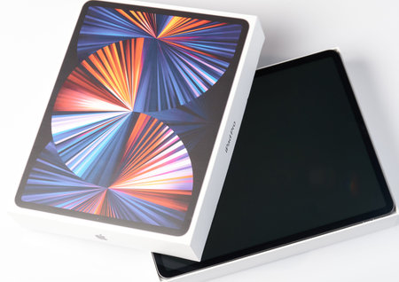 New york, USA - September 3 2021: Open box of apple ipad pro on white studio background