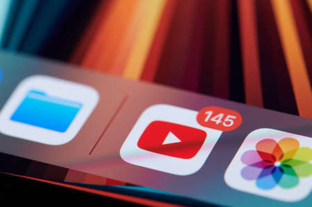 New york, USA - September 3 2021: Youtube app on apple smartphone screen close up viewのeditorial素材