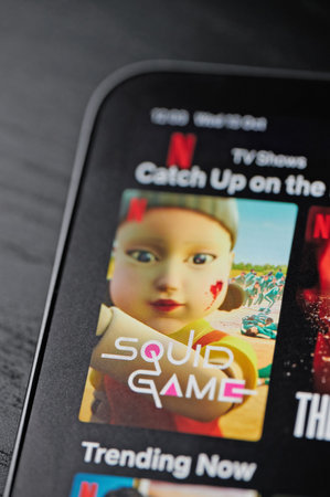 New york, USA - October 13 2021: Squid game series  on netflix platform on ipad screen close up view