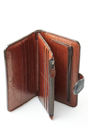 Empty leather wallet isolated on studio white background