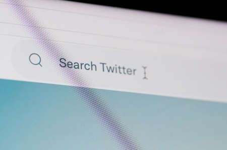 New york, USA - January 31 2022: Search bar in twitter app on smartphone screen close up viewのeditorial素材