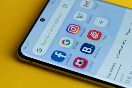 New york, USA - june 21, 2022: Opera mini browser with apps on smartphone screen close up viewのeditorial素材
