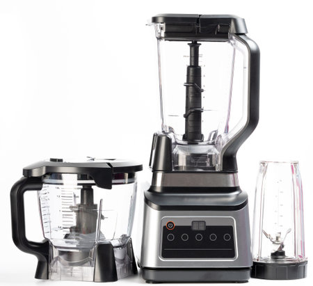 Kitchen  blender tool  with additional cups isolated on studio background