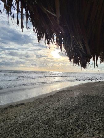 Paradise beach on sunset time with roof copy spaceの写真素材