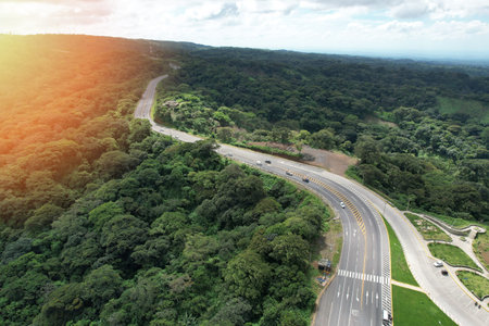 Mountain central american road aerial drone view on bright sunny day