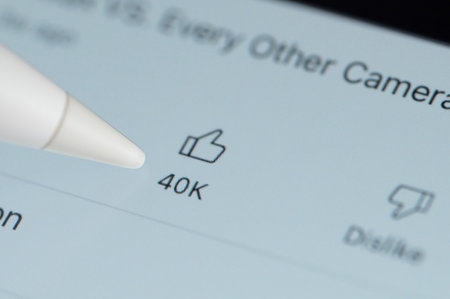 New york, USA - October 11, 2022: Like reaction on youtube video on screen macro close up view backgroundのeditorial素材