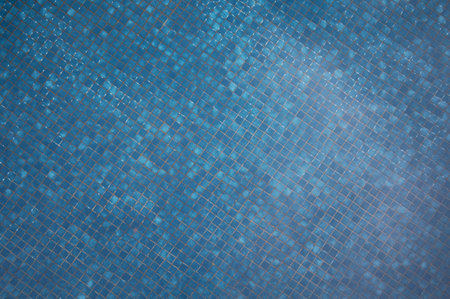 Mosaic sqaure pool tiles on bottom close up viewの写真素材