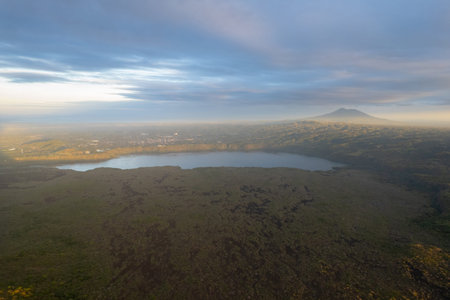Nicaragua volcanic valley with Masaya lake and Mombacho volcano on sunset timeの写真素材