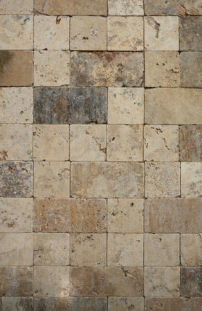 Brown square wall stone tiles background close up viewの写真素材