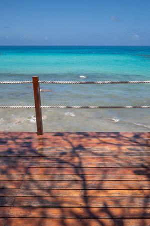 Empty wooden platform deck on Caribbean sea backgroundの写真素材