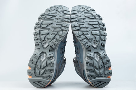 Clean trail  shoe sole isolated on grey studio backgroundの写真素材