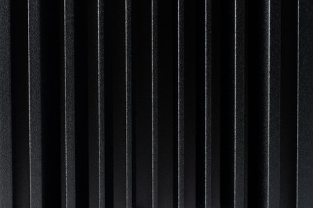 Black metal radiator pattern background close up viewの写真素材