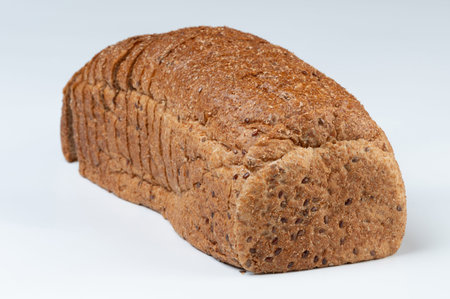 Sliced bread with seed  wholegrain front view isolated on studio background