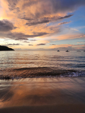 Beautiful sunset colors on ocean beach  backgroundの写真素材