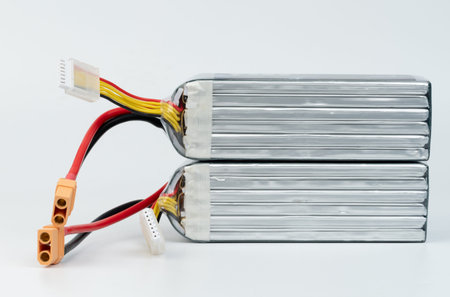 New polymer batteries with wire connector isolated on white studio background