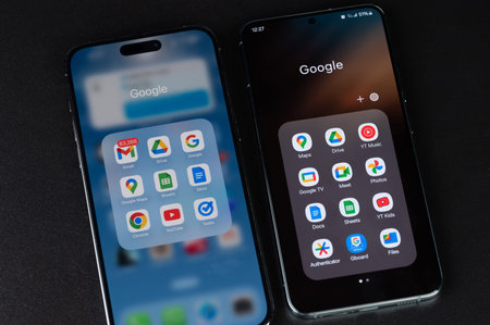 New York, USA - December 11, 2023: Google  apps on Iphone and android smartphone screen close up...