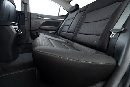 Clean car backseat dark gray textile material with isolated windowsの写真素材