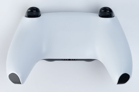 Back view of modern game joystick isolated on studio background